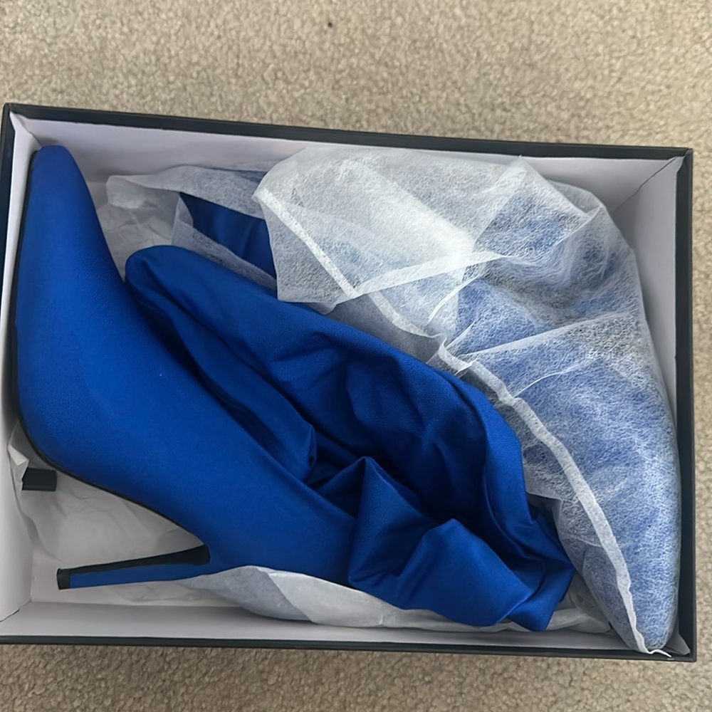 Thigh high heels from Akria